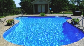 Vinyl-liner-color-coordinates-sealed-steel-handrails-planter-water-feature-with-pool-house