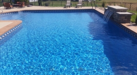 Geometric-vinyl-pool-with-raised-sheer-descent